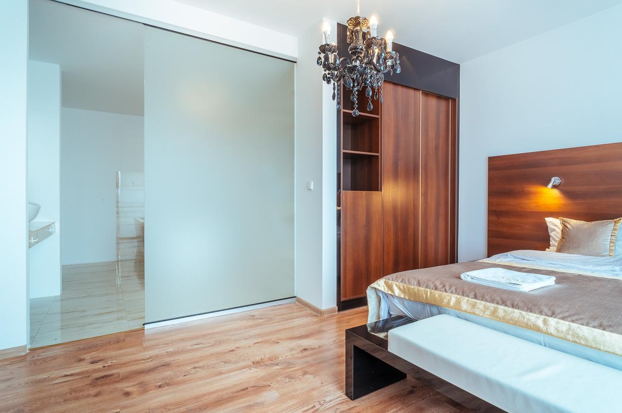 Apartamenty M&M Mikołajki Buitenkant foto